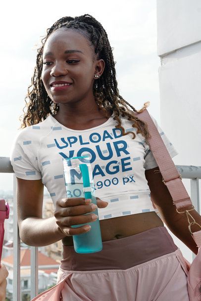 Crop Top Mockup of a Fit Woman Walking Out From the Gym M20717-r-el2