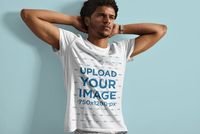 Basic T-Shirt Mockup Features a Bearded Man With His Hands Behind His Head