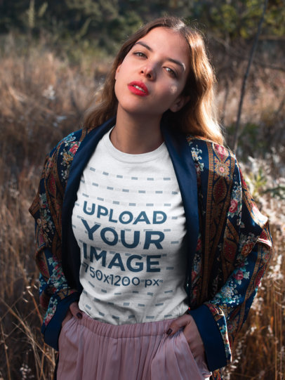 Pretty Woman Wearing a Round Neck T-Shirt Mockup while Outdoors