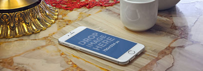 White iPhone 6 On Tea Shop Wide