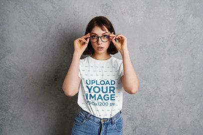 Heathered T-Shirt Mockup Featuring a Woman Adjusting Her Glasses