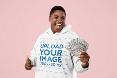 Hoodie Mockup of a Woman Holding a Bunch of Money