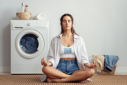 Crop Top Mockup Featuring a Relaxed Woman Doing Yoga