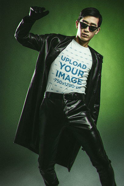 Bella Canvas T-Shirt Mockup of a Serious Man With Sunglasses in a Matrix-Inspired Outfit 