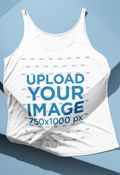 Mockup of a Bella Canvas Tank Top Placed over an Embossed Surface