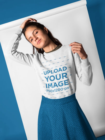 Beautiful White Woman Wearing a Crewneck Sweater Mockup while Posing for the Camera