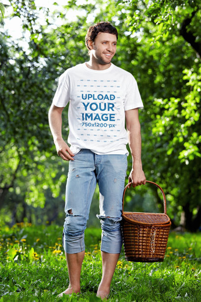 T-Shirt Mockup of a Man Walking Barefoot Towards a Picnic