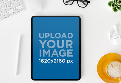 iPad Pro Mockup Featuring an Espresso Cup and a Pair of Glasses m21399-r-el2