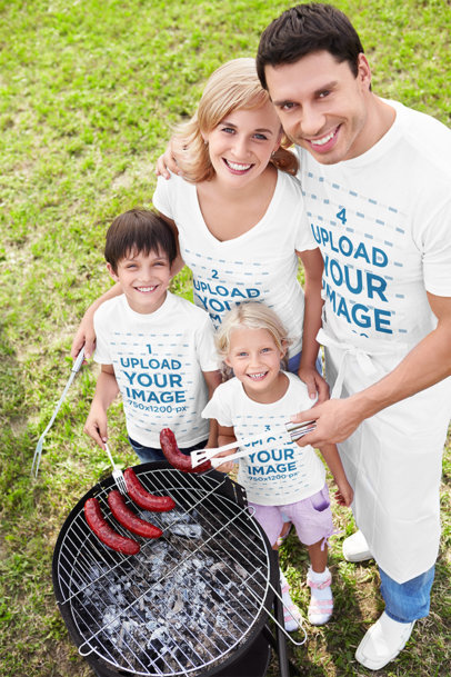 T-Shirt Mockup of a Happy Family Making Some Hot Dogs m20351-r-el2