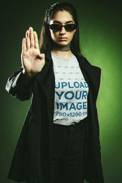 T-Shirt Mockup of a Cool Woman Wearing an Outfit Inspired by Neo from The Matrix