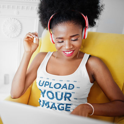 Tank Top Mockup Featuring a Woman with Curly Hair Wearing Headphones