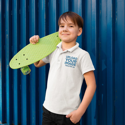 Polo Shirt Mockup Featuring a Smiling Boy With a Green Skateboard