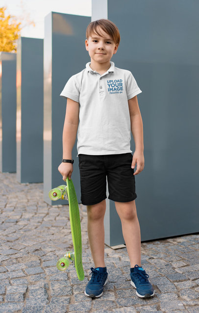 Polo Shirt Mockup of a Boy Holding a Small Skateboard 