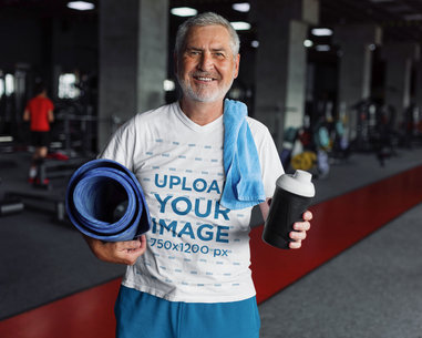V-Neck T-Shirt Mockup Featuring a Middle-Aged Man at the Gym