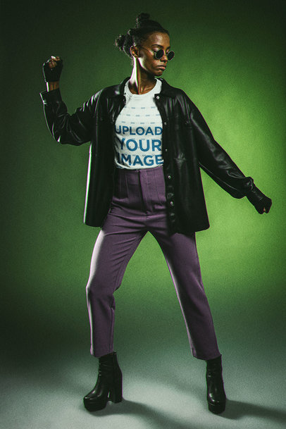 Bella Canvas T-Shirt Mockup of a Woman in a Matrix-Inspired Costume Wearing Sunglasses