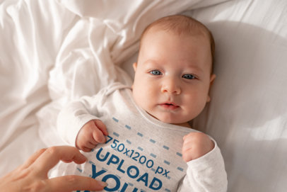 Long Sleeve Heathered Onesie Mockup Featuring a Little Baby