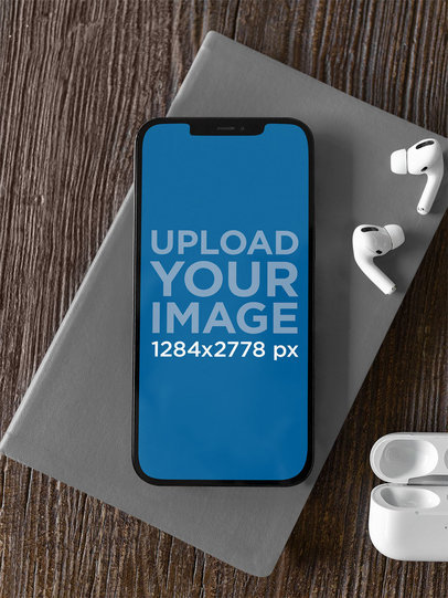 Mockup of an iPhone 12 Pro Max with a Pair of AirPods