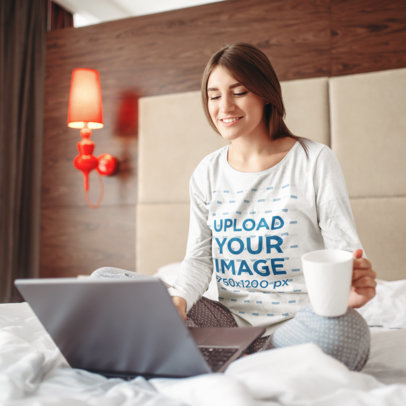 Heathered Long-Sleeve Tee Mockup Featuring a Smiling Woman Working on Her Laptop m19706 r-el2