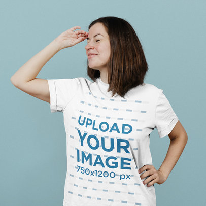 T-Shirt Mockup of a Short-Haired Woman Happily Posing in a Studio