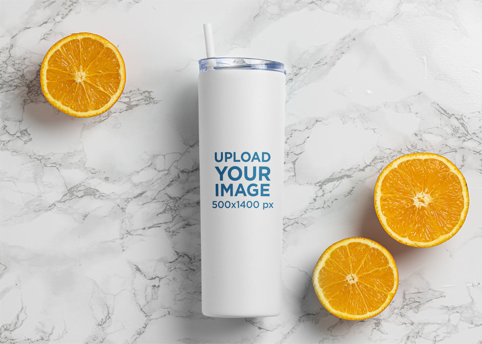 Skinny Tumbler Mockup Featuring Some Oranges