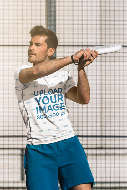Sublimated T-Shirt Mockup of a Serious Man Playing Tennis