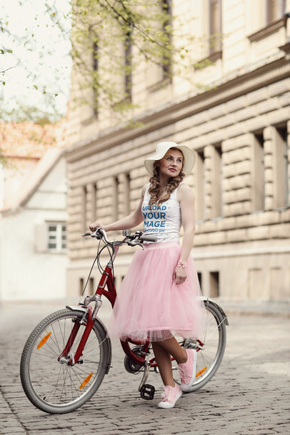 Tank Top Mockup of a Woman in a Tutu Posing With a Bike