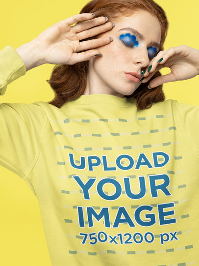 Sweatshirt Mockup Featuring a Woman With Trendy Makeup in a Studio