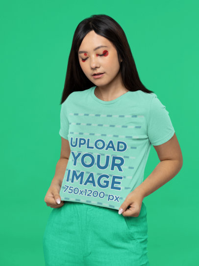 Bella Canvas Tee Mockup Featuring a Woman with Creative Eye Makeup