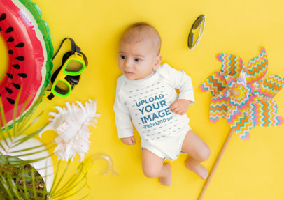 Onesie Mockup of a Baby Surrounded by Vacation Ornaments m20527-r-el2