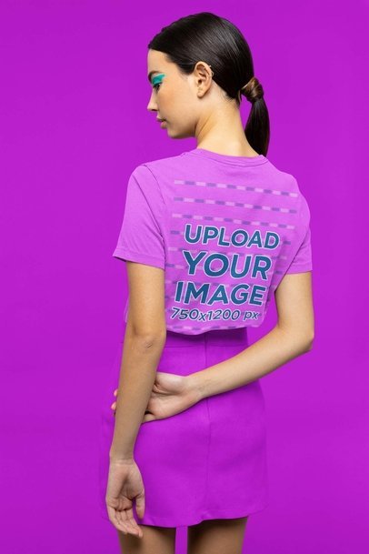 Back-View Mockup of a Woman With Makeup Wearing a Bella Canvas T-Shirt