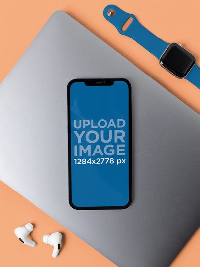 Mockup of an iPhone 12 Pro Max Featuring Other Apple Devices