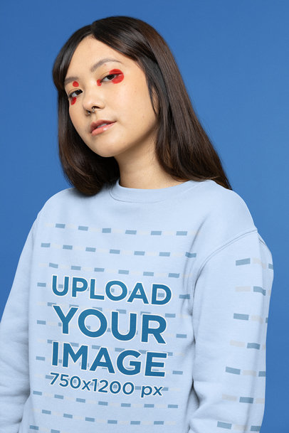 Sweatshirt Mockup Featuring a Serious Woman with Euphoria-Inspired Makeup