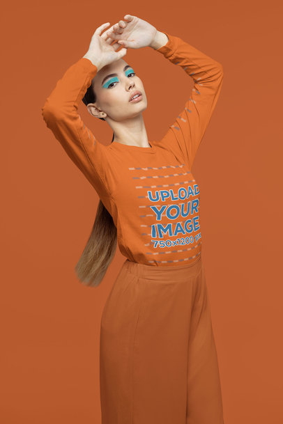 Long Sleeve Tee Mockup of a Woman With Graphic Makeup Posing