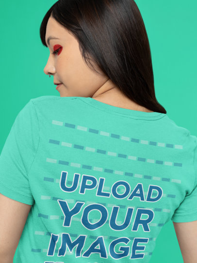 Back-View T-Shirt Mockup Featuring a Woman with Graphic Eye Makeup