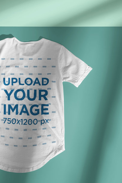 Mockup of the Back of a T-Shirt Lying Under Regular Shades m13430