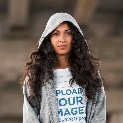 Mockup of a Woman With Long Curly Hair Wearing a Tee 