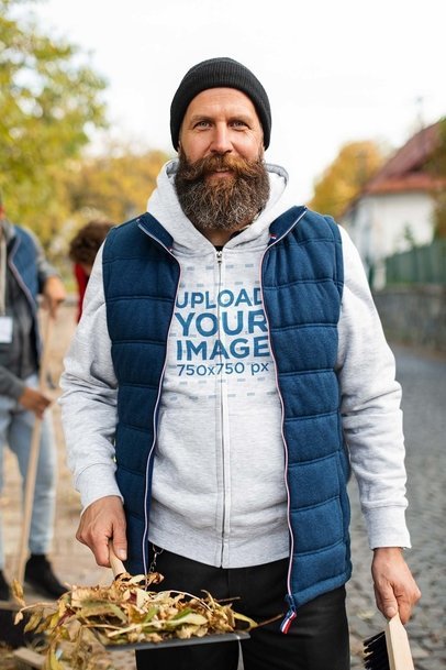 Hoodie Mockup of a Bearded Volunteer Cleaning a Street m21846-r-el2