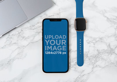Mockup of an iPhone 12 Pro Max Facing Up Next to a Smartwatch m21879