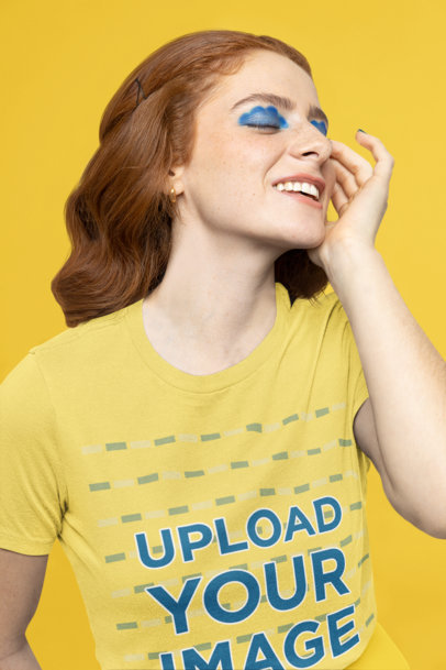 T-Shirt Mockup of a Happy Woman Wearing Modern Blue-Colored Makeup M21356