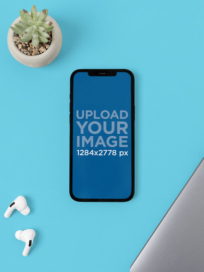 iPhone 12 Pro Max Mockup Featuring a Small Succulent Pot m21866