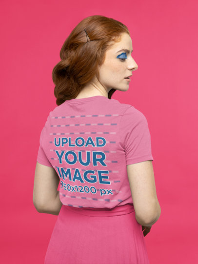 Colorful Mockup of a Woman Wearing a Bella Canvas T-Shirt in a Studio M21357