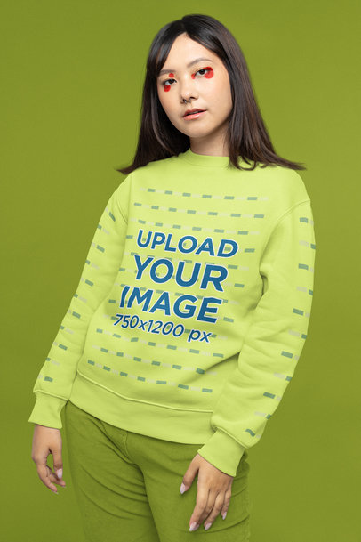 Sweatshirt Mockup of a Young Woman Wearing Graphic Makeup and a Nose Piercing