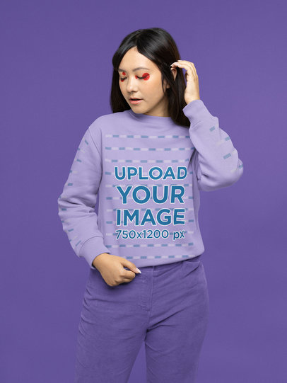 Sweatshirt Mockup Featuring a Woman With a Makeup Look Inspired by Euphoria