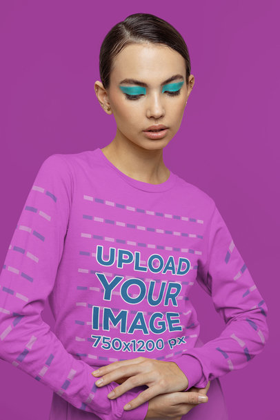 Long-Sleeve Tee Mockup of a Serious Young Woman With a Euphoria-Inspired Eye Look