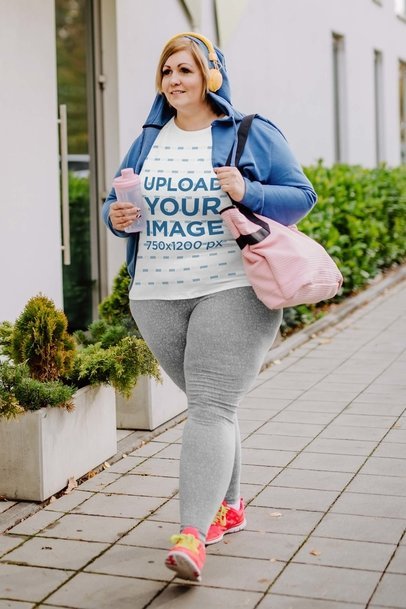  T-Shirt Mockup Featuring a Smiling Woman Walking with her Activewear Outfit m21412-r-el2