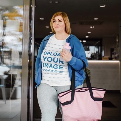 Mockup of a Woman Wearing a T-Shirt While Getting Out of the Gym m21454-r-el2