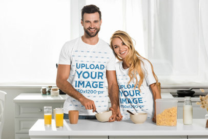 T-Shirt Mockup Featuring a Happy Couple Making Breakfast