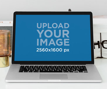Mockup of a MacBook Placed on a Desk