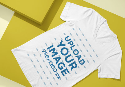 Mockup of a Bella Canvas V-Neck T-Shirt Lying in an Angled Position