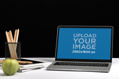 Mockup of a MacBook Pro Placed in an Education-Themed Setting M15612-r-el2